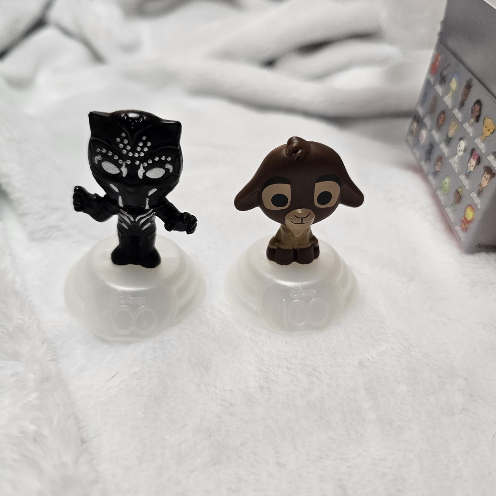 Tchalla (Black Panther) and Valentino (Wish) from McDonald's Disney 100